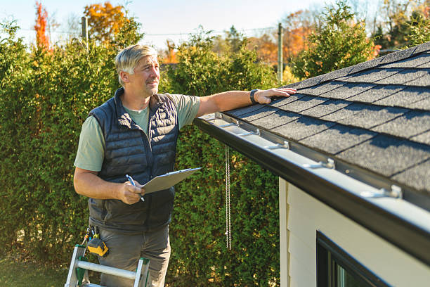 Professional Roofing technician working in Ault, CO